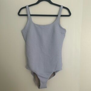 Lululemon one piece swimsuit. Light purple. Size 10. Never worn.